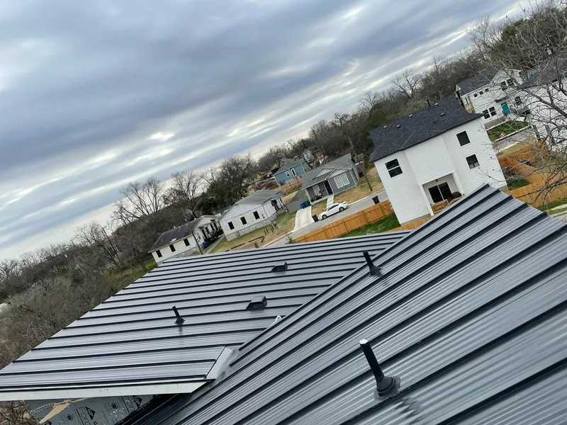 Standing seam metal roof panels with vents for Skylight Repair in Richmond Heights